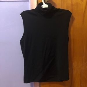 sleeveless black turtleneck